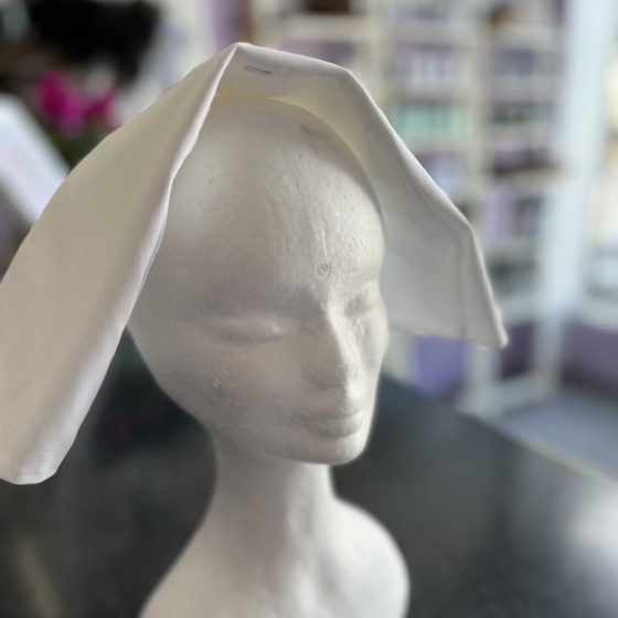 A clean white starched 1930's nurse cap
